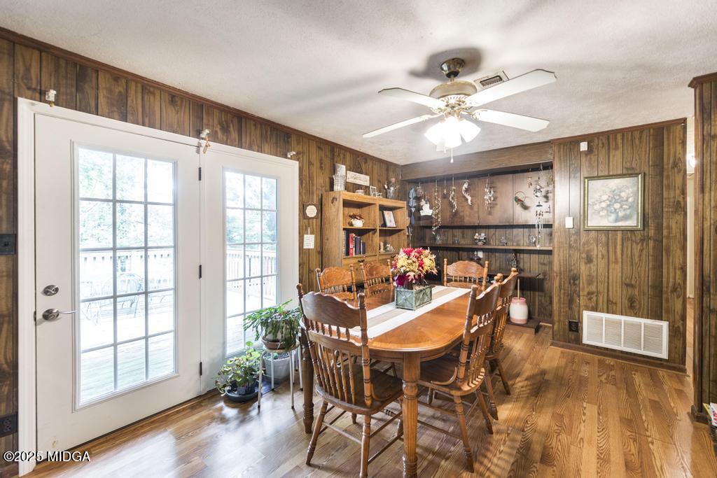 4112 West Hickory Court Macon, GA 31210 - Photo 4 of 12 a view of a dining room with furniture window and wooden floor