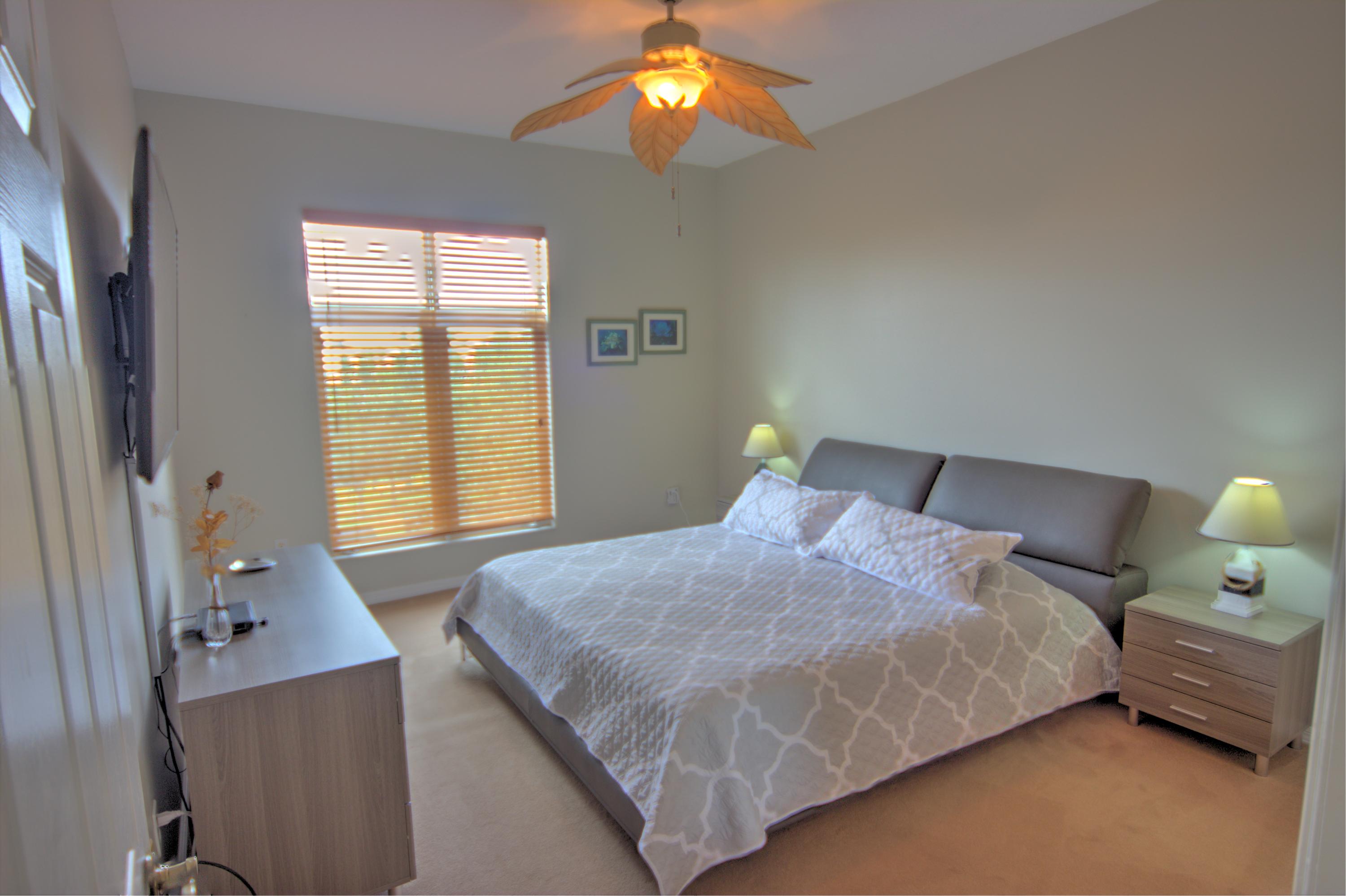 1155 Main Street, Unit 304 Jupiter, FL 33458 - Photo 19 of 38 Master bedroom
