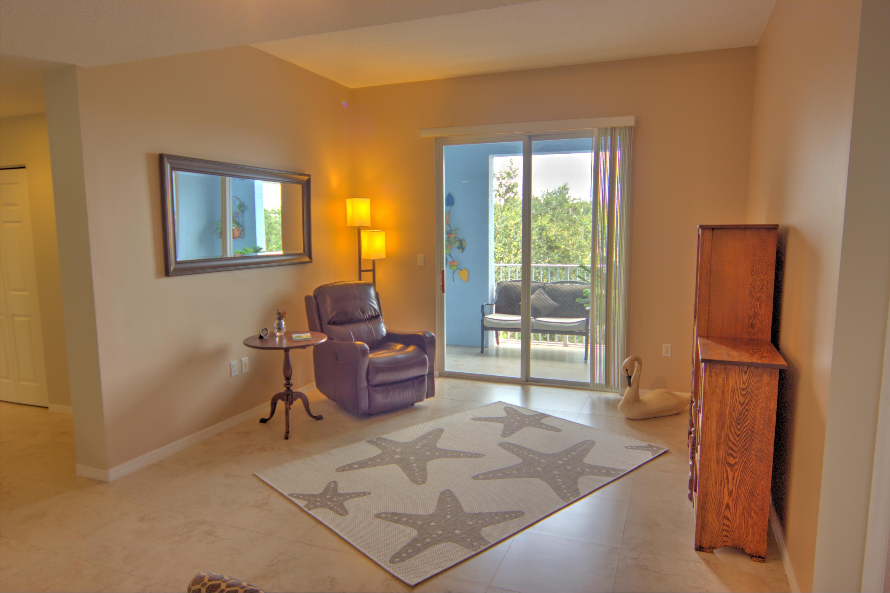 1155 Main Street, Unit 304 Jupiter, FL 33458 - Photo 3 of 38 living room