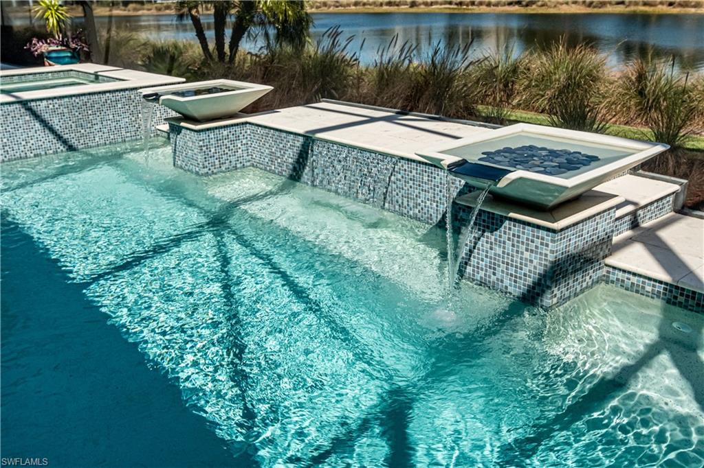 6262 Lightbourn Way Naples, FL 34113 - Photo 4 of 49 a view of a backyard with sitting area