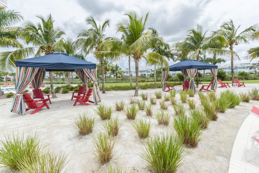 6262 Lightbourn Way Naples, FL 34113 - Photo 46 of 49 a view of outdoor space with sitting area