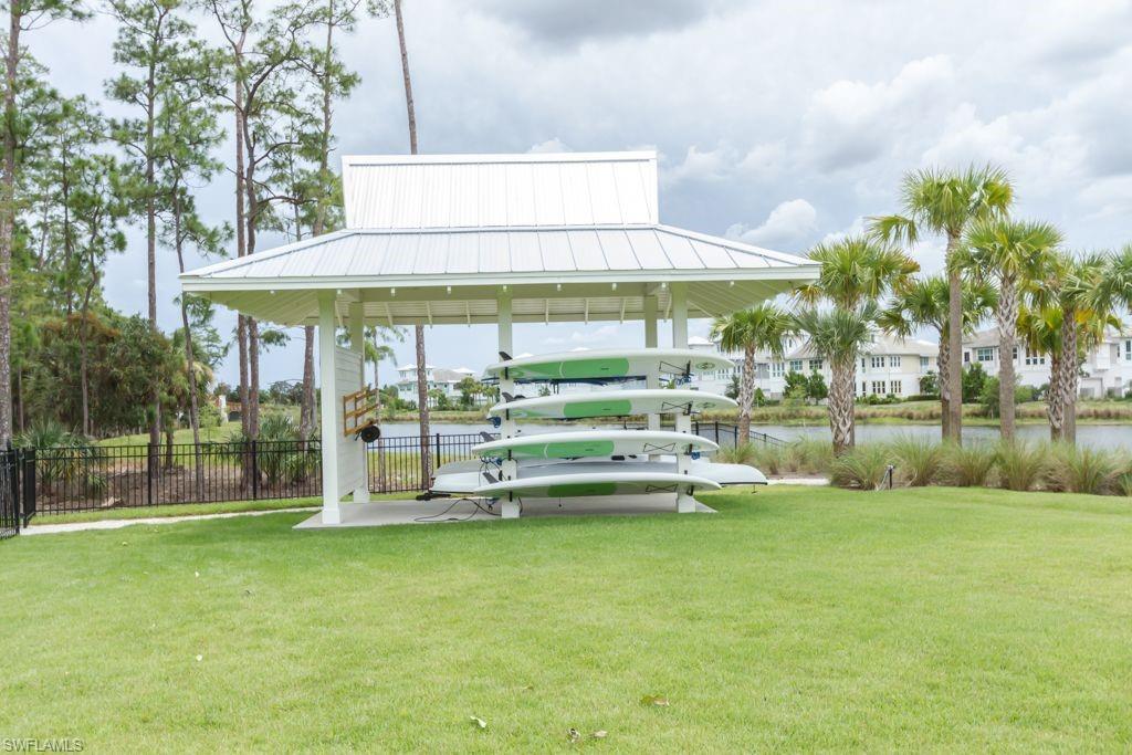 6262 Lightbourn Way Naples, FL 34113 - Photo 48 of 49 a view of a house with a yard balcony and sitting area