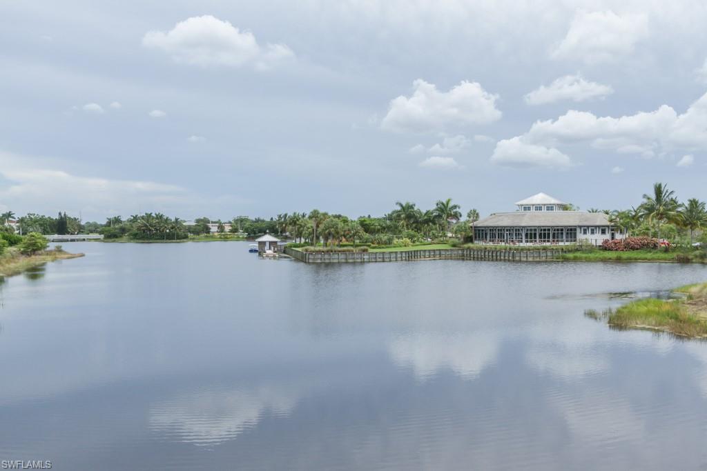 6262 Lightbourn Way Naples, FL 34113 - Photo 49 of 49 a view of a lake with a city view