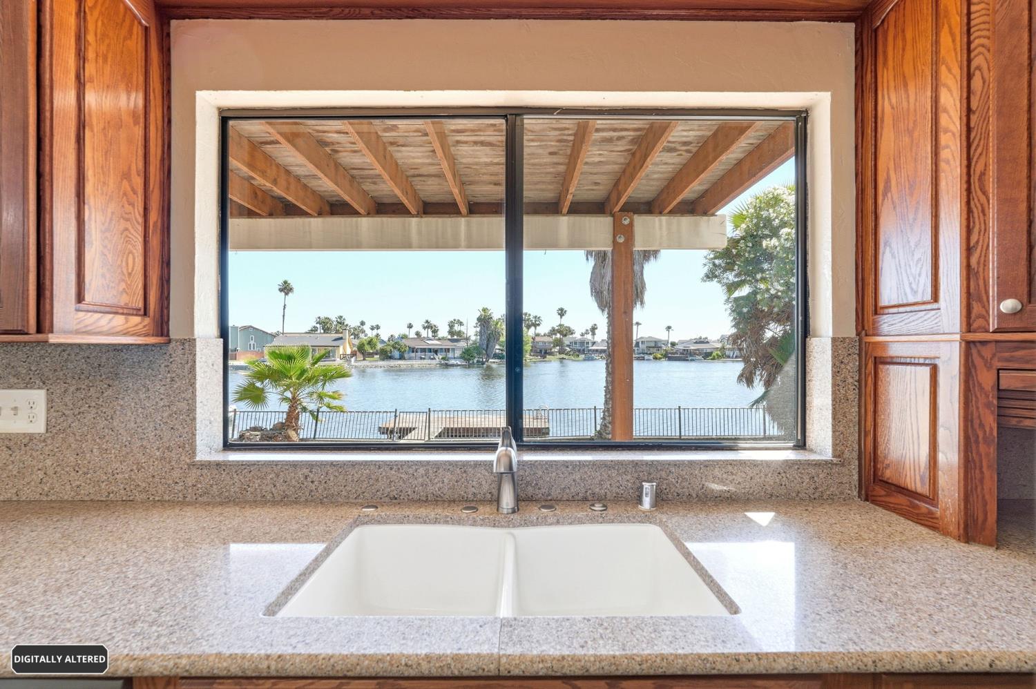 5501 Riverlake Road Discovery Bay, CA 94505 - Photo 25 of 60 a swimming pool view from a balcony