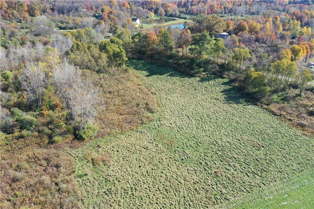 0 Lamor Road Mercer, PA 16137 - Photo 28 of 38 a view of a lake with houses