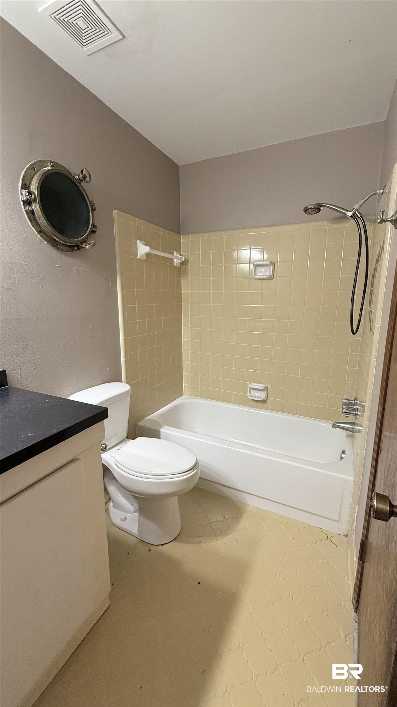 4131 Springdale Road Mobile, AL 36609 - Photo 18 of 28 Full bathroom featuring shower / tub combination and vanity