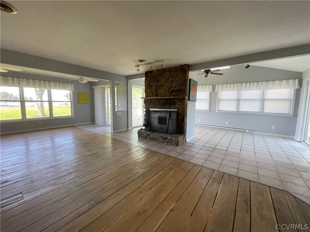 380 Mulberry Creek Road Lancaster, VA 22503 - Photo 9 of 29 LR, Sunroom, Fireplace