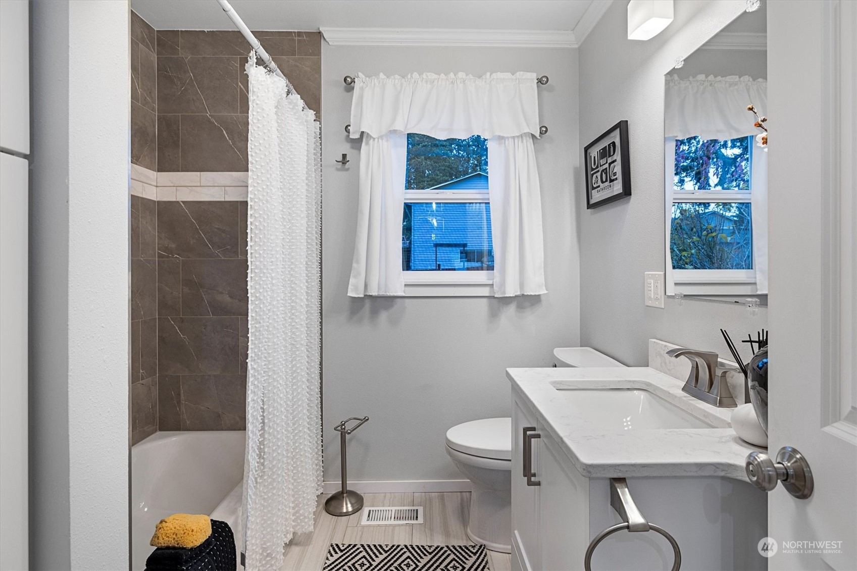 24008 Meridian Avenue South Bothell, WA 98021 - Photo 16 of 31 a bathroom with a granite countertop sink toilet and shower