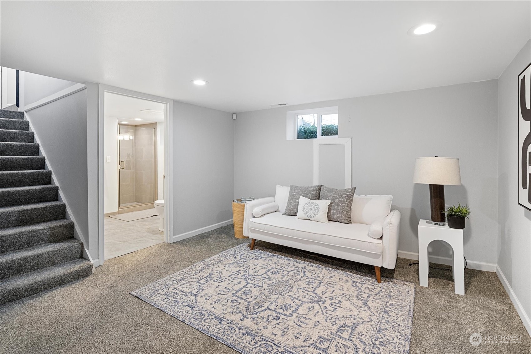 24008 Meridian Avenue South Bothell, WA 98021 - Photo 17 of 31 a living room with furniture and a rug