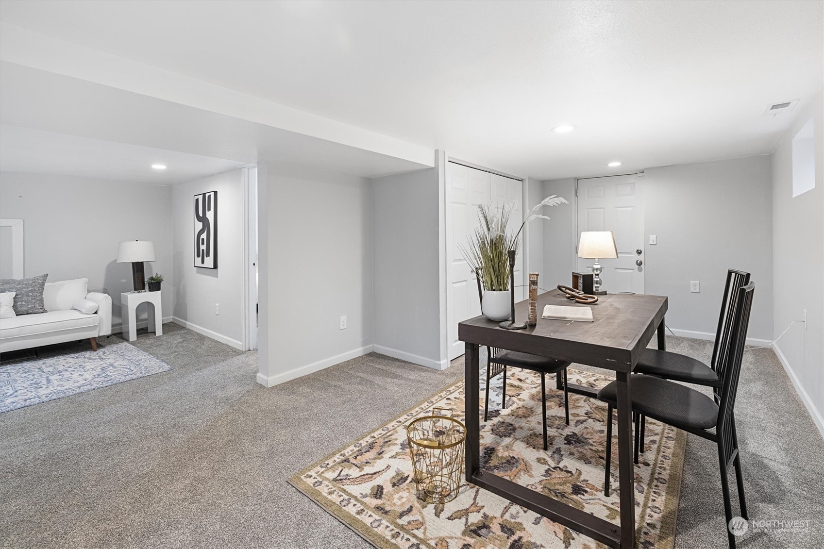 24008 Meridian Avenue South Bothell, WA 98021 - Photo 19 of 31 a view of a livingroom with furniture and a rug