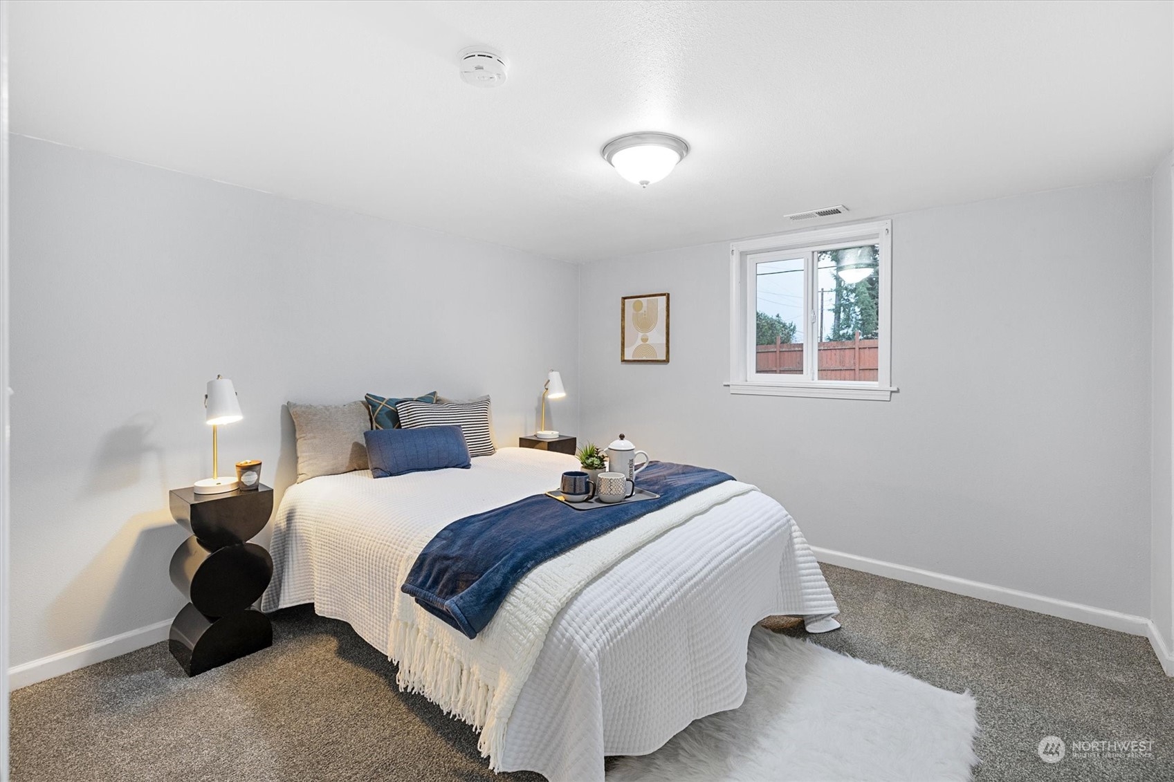 24008 Meridian Avenue South Bothell, WA 98021 - Photo 20 of 31 a bedroom with bed and window