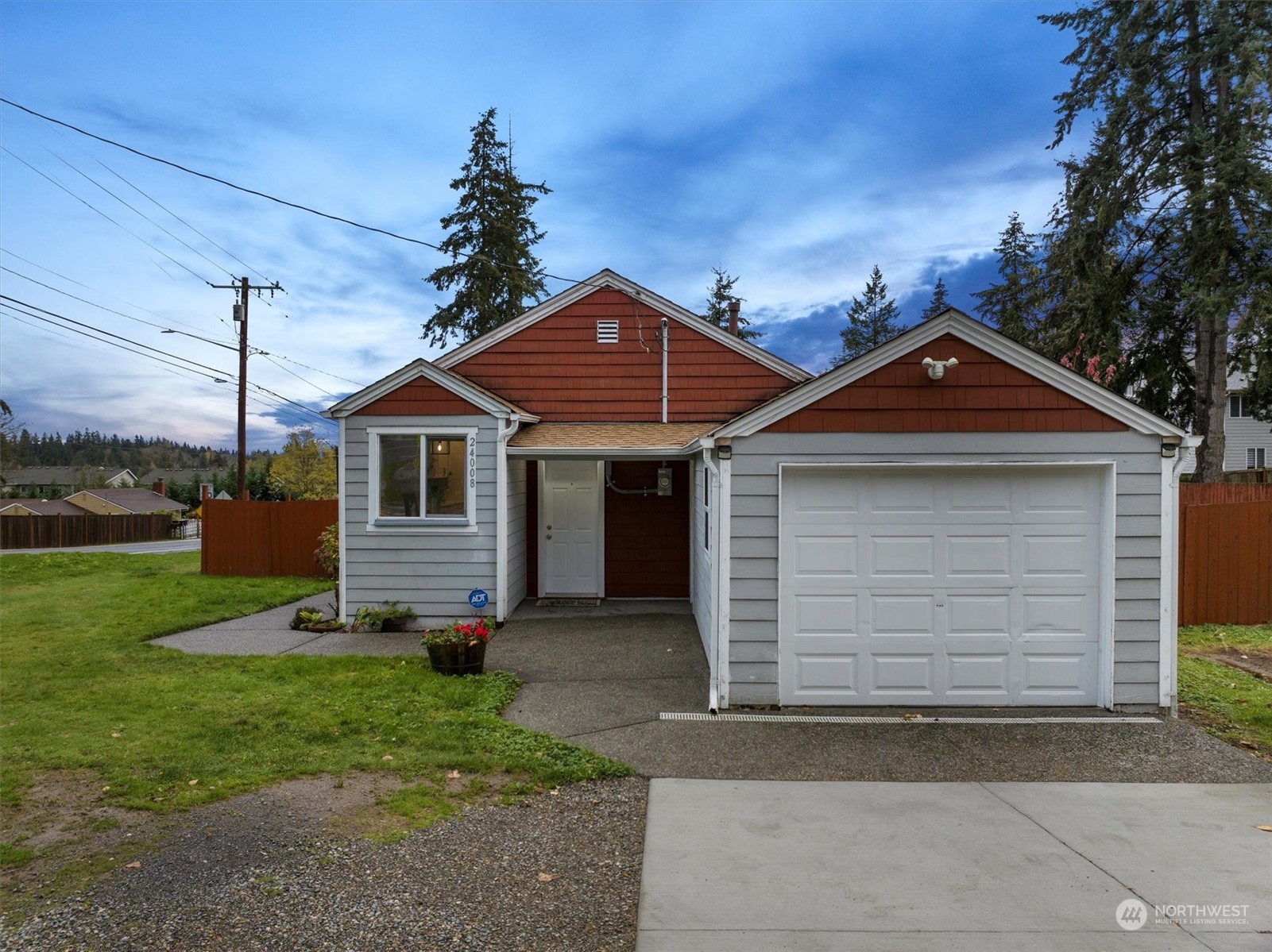 24008 Meridian Avenue South Bothell, WA 98021 - Photo 3 of 31 a front view of a house with a yard