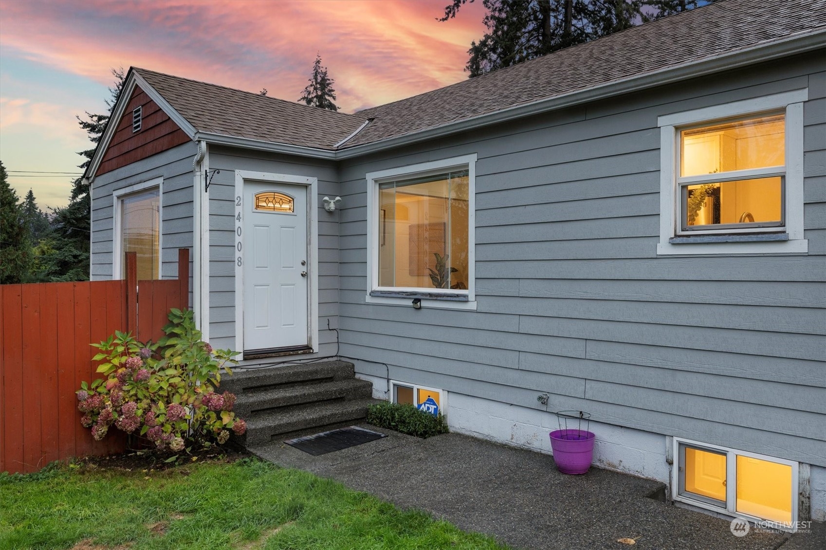 24008 Meridian Avenue South Bothell, WA 98021 - Photo 4 of 31 a front view of a house with a yard
