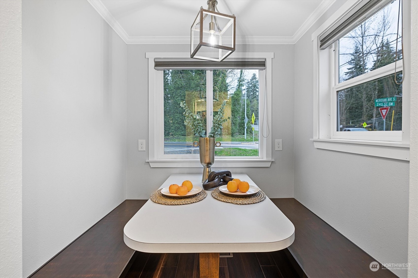 24008 Meridian Avenue South Bothell, WA 98021 - Photo 8 of 31 a view of a dining room with a table and chairs