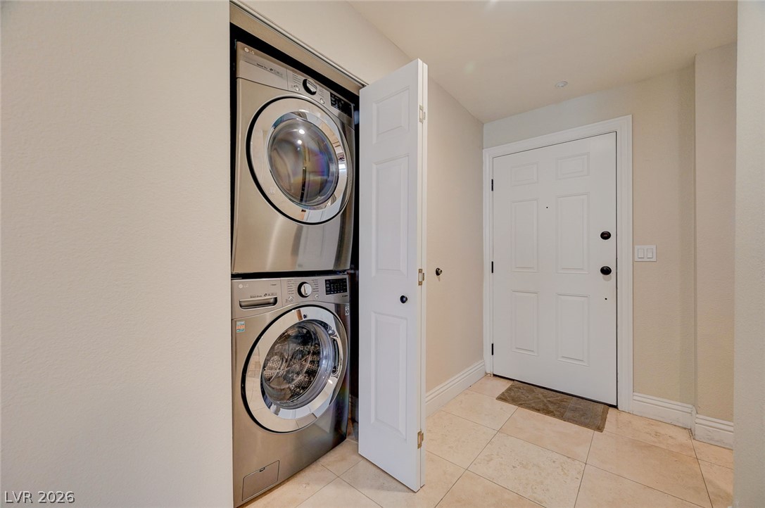 230 East Flamingo Road, Unit 106 Las Vegas, NV 89169 - Photo 21 of 66 A well-appointed laundry closet offers convenience adjacent to the entry.