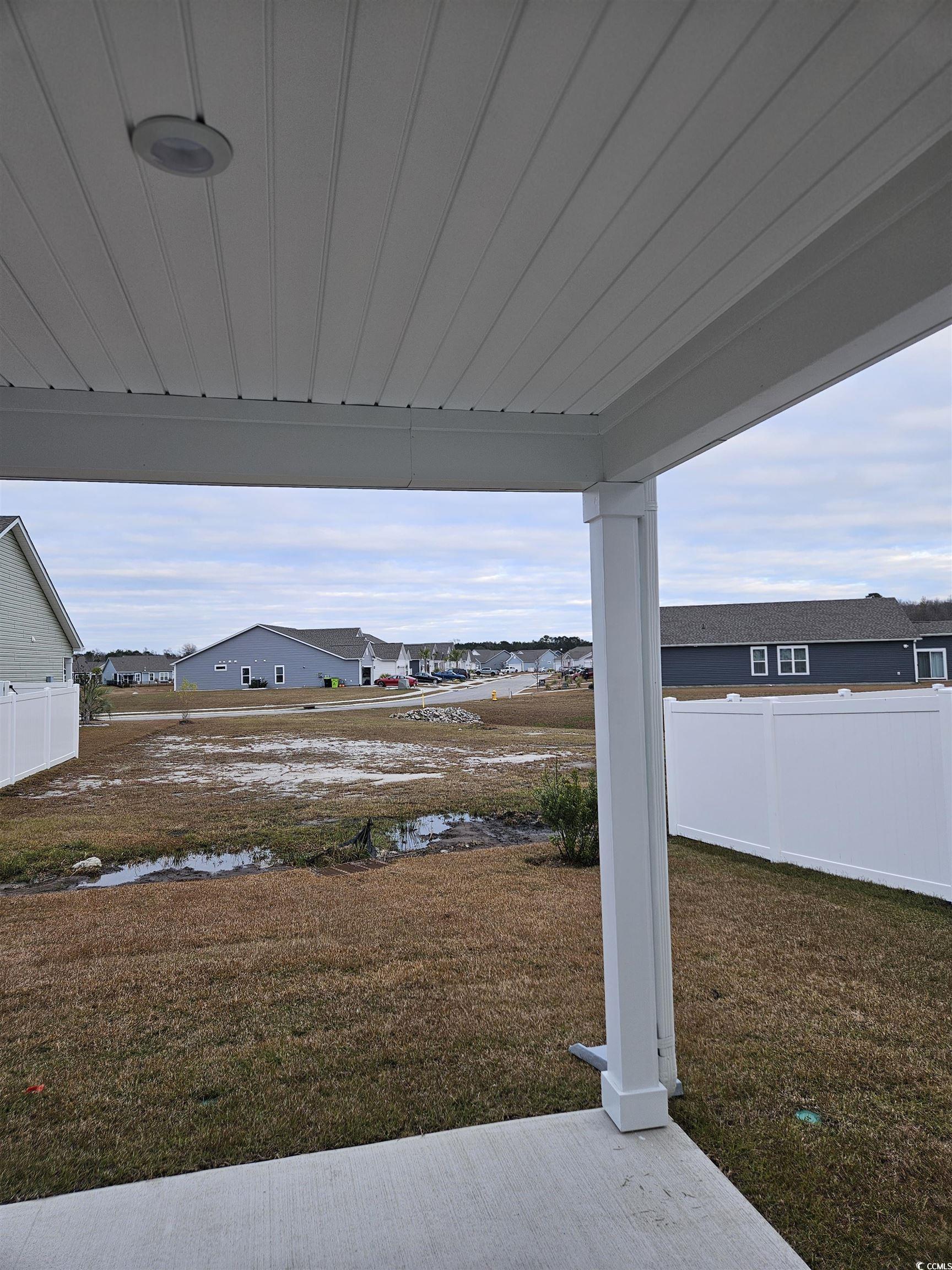 371 Kapalua Loop Little River, SC 29566 - Photo 30 of 37 View of yard with a patio