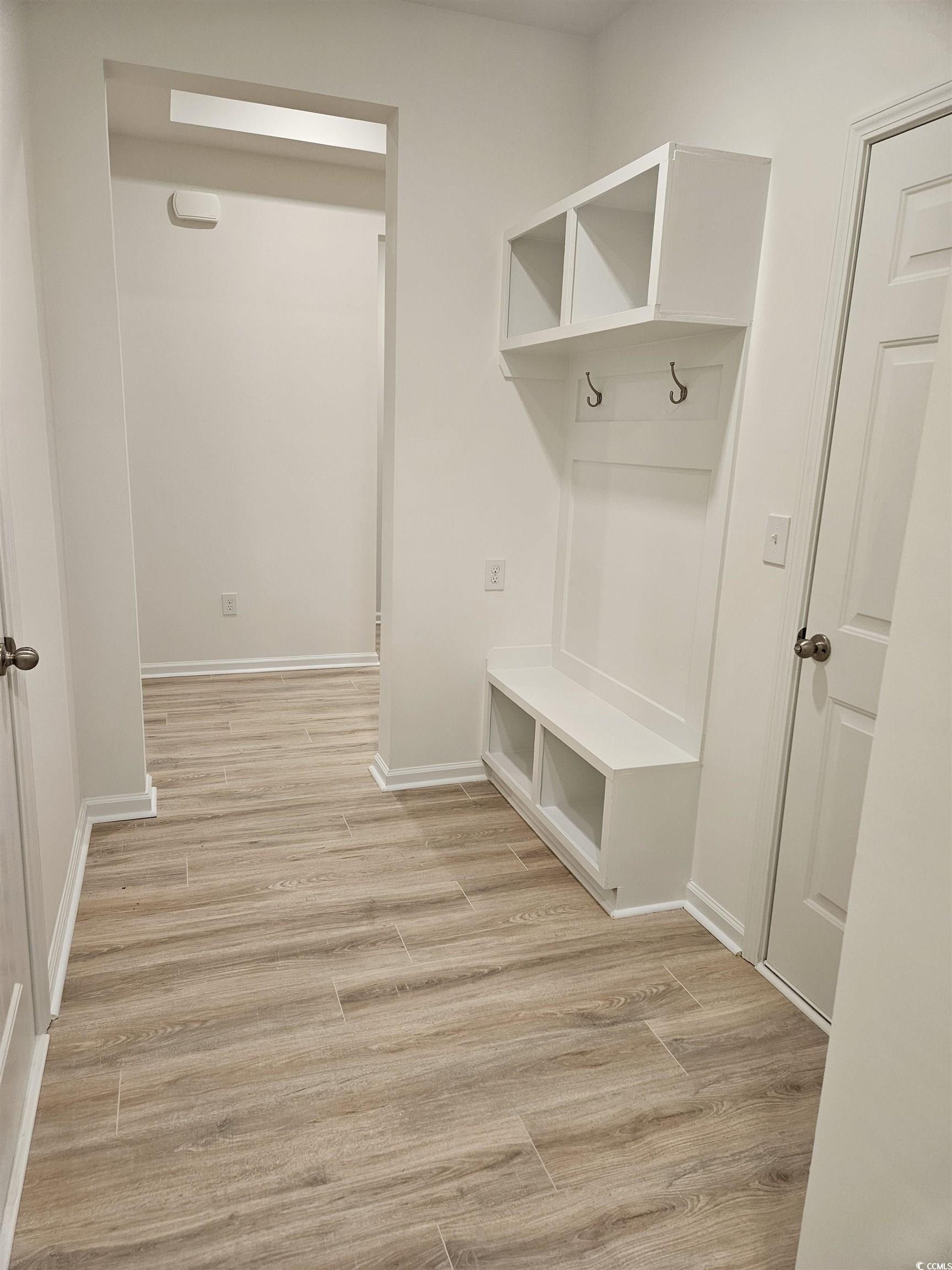 371 Kapalua Loop Little River, SC 29566 - Photo 34 of 37 Mudroom featuring light wood-type flooring and baseboards