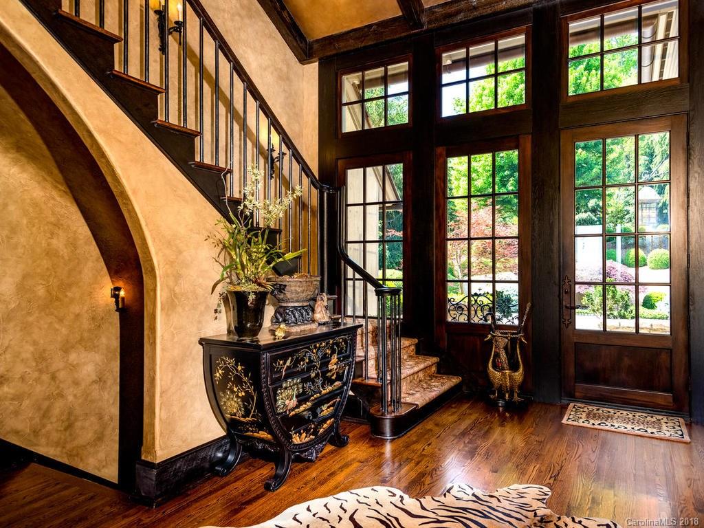 1929 Tree View Trail Arden, NC 28704 - Photo 2 of 35 a living room with furniture tv and a window