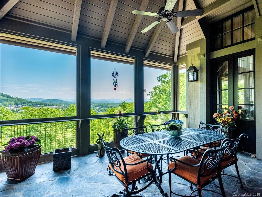 1929 Tree View Trail Arden, NC 28704 - Photo 11 of 35 a outdoor dining space with furniture and outdoor view