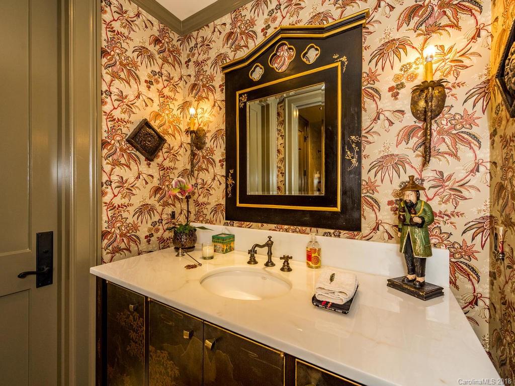 1929 Tree View Trail Arden, NC 28704 - Photo 20 of 35 a bathroom with a sink and a mirror