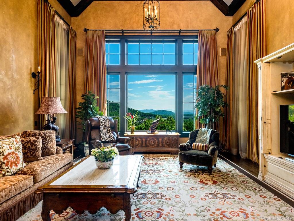 1929 Tree View Trail Arden, NC 28704 - Photo 3 of 35 a view of a house with backyard and sitting area