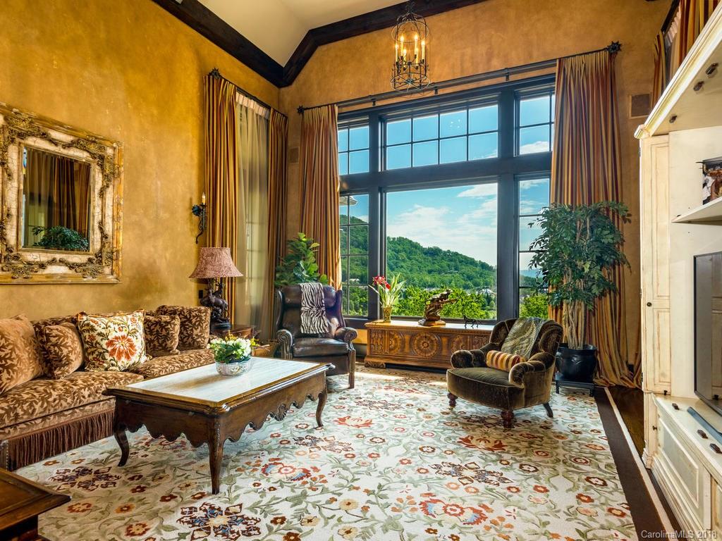1929 Tree View Trail Arden, NC 28704 - Photo 5 of 35 a outdoor space with patio the couches and a dining table with garden view