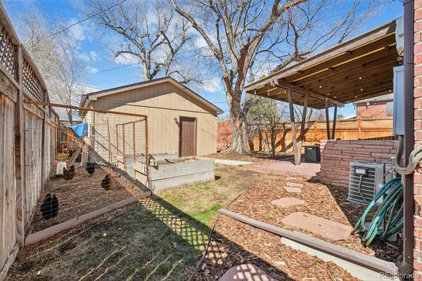 a view of a back yard of the house