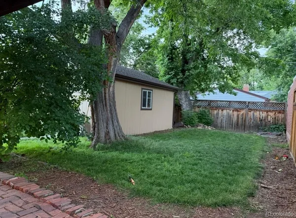 a view of a back yard of the house