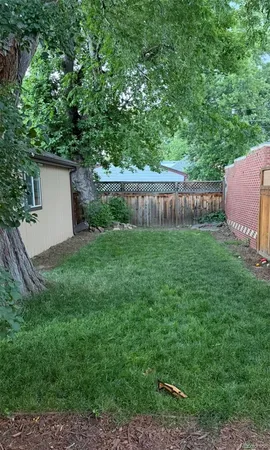 a view of backyard with green space