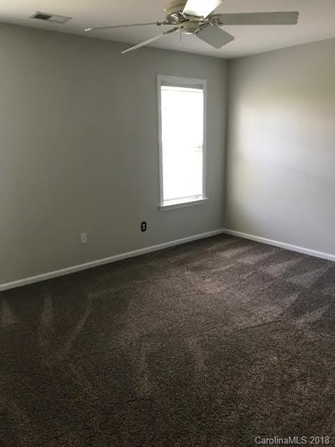 14925 Scothurst Lane Charlotte, NC 28277 - Photo 7 of 9 an empty room with a window