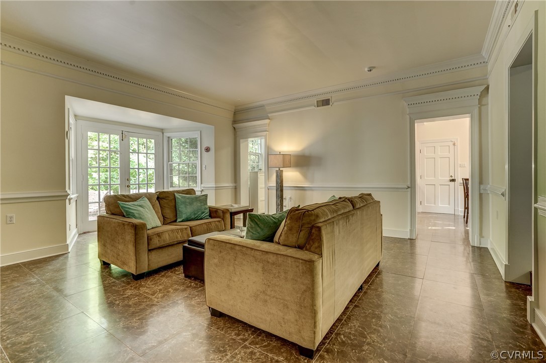 4701 Butte Road Richmond, VA 23235 - Photo 16 of 47 a living room with furniture and a couch