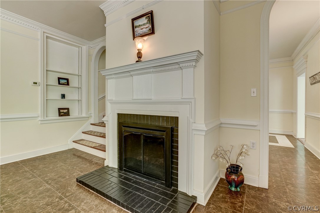 4701 Butte Road Richmond, VA 23235 - Photo 17 of 47 a living room with furniture and a fireplace