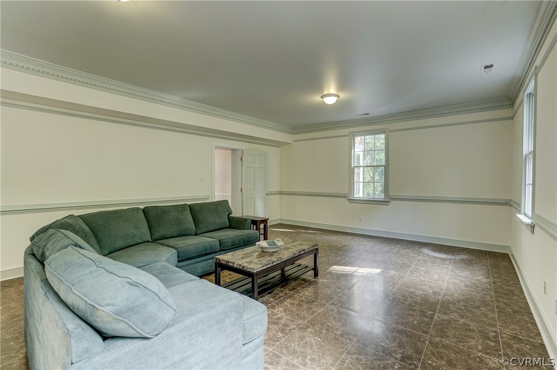 4701 Butte Road Richmond, VA 23235 - Photo 21 of 47 a living room with furniture and a rug