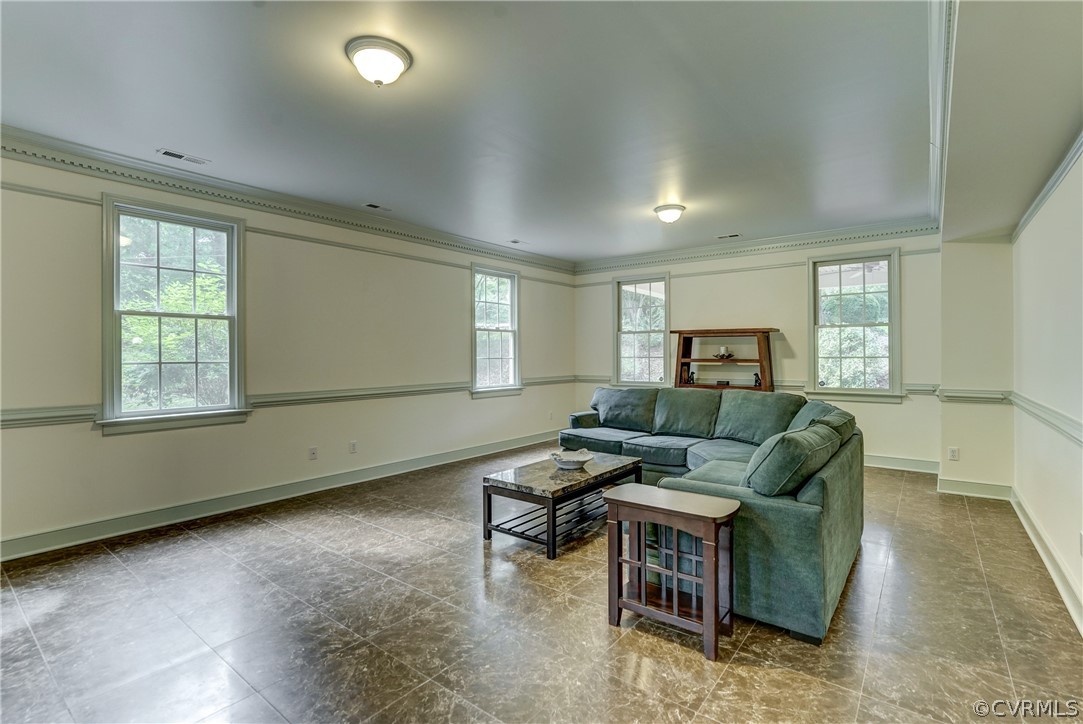4701 Butte Road Richmond, VA 23235 - Photo 22 of 47 a living room with furniture and a window