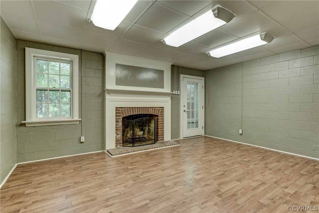 4701 Butte Road Richmond, VA 23235 - Photo 27 of 47 a view of empty room with wooden floor and fireplace