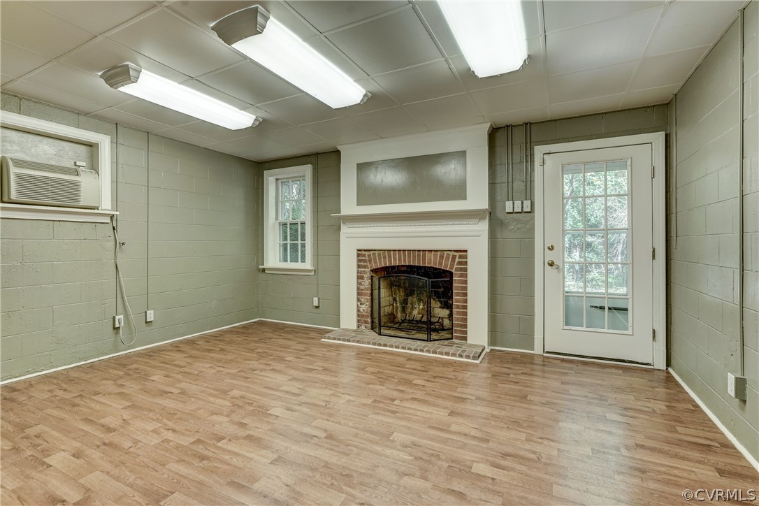 4701 Butte Road Richmond, VA 23235 - Photo 28 of 47 a view of a livingroom with an empty space and a fireplace