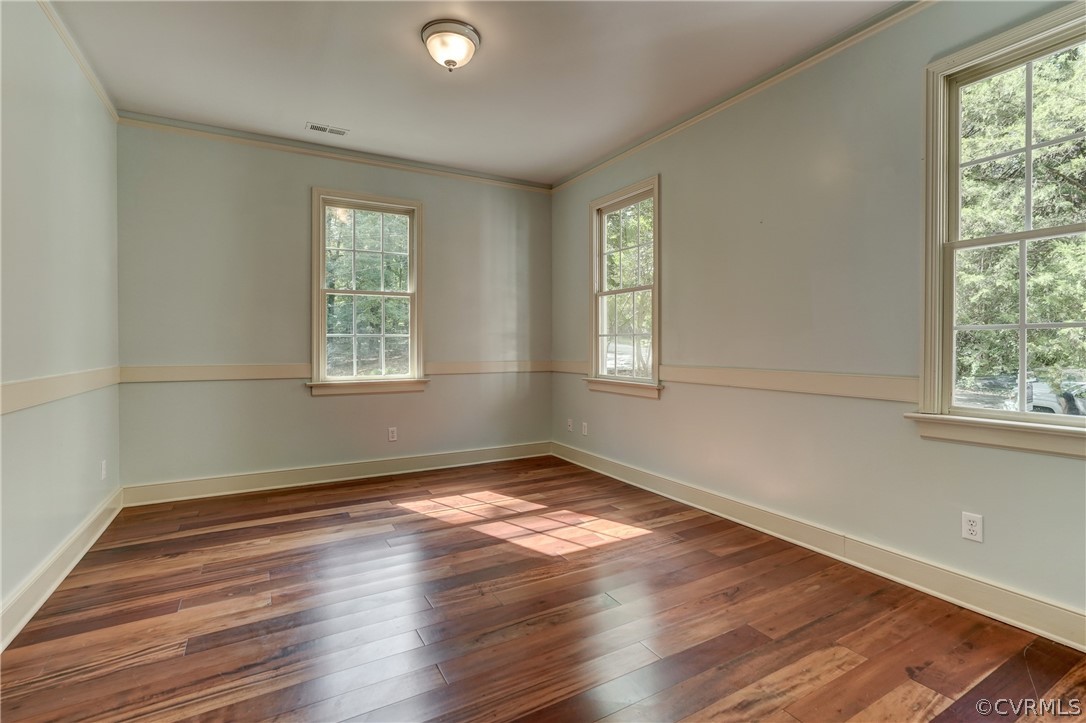 4701 Butte Road Richmond, VA 23235 - Photo 33 of 47 an empty room with wooden floor and windows