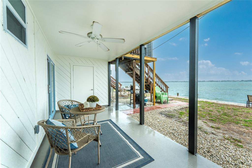 5041 North Beach Road, Unit 3A AND 3B Englewood, FL 34223 - Photo 24 of 52 a view of a livingroom with furniture and entryway
