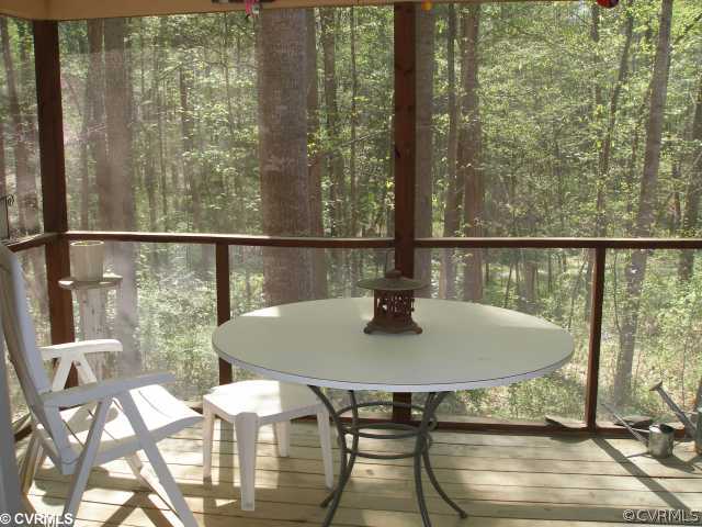3205 Shadow Oaks Road Midlothian, VA 23112 - Photo 11 of 11 a view of a dining room with furniture window and outside view