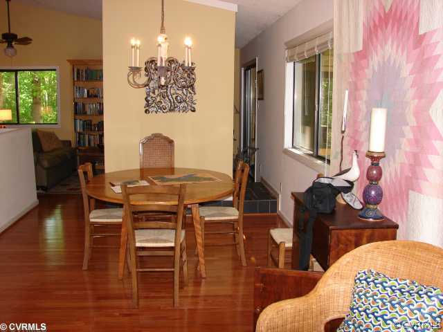 3205 Shadow Oaks Road Midlothian, VA 23112 - Photo 5 of 11 a view of a dining room with furniture and wooden floor