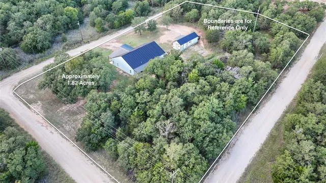 a view of a swimming pool with an outdoor space and seating area