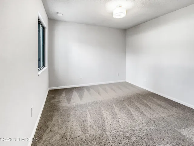 an empty room with a workbench