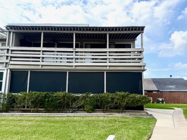 178 April Point Drive North Montgomery, TX 77356 - Photo 13 of 17 a front view of a house with a yard