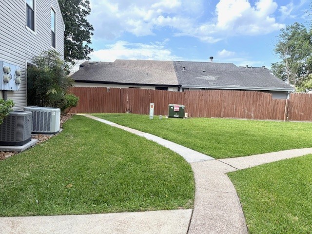178 April Point Drive North Montgomery, TX 77356 - Photo 15 of 17 a view of a backyard with green space