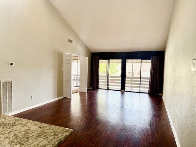 178 April Point Drive North Montgomery, TX 77356 - Photo 2 of 17 wooden floor in an empty room with a window