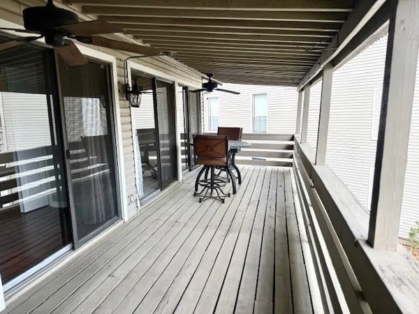 a view of balcony with chairs