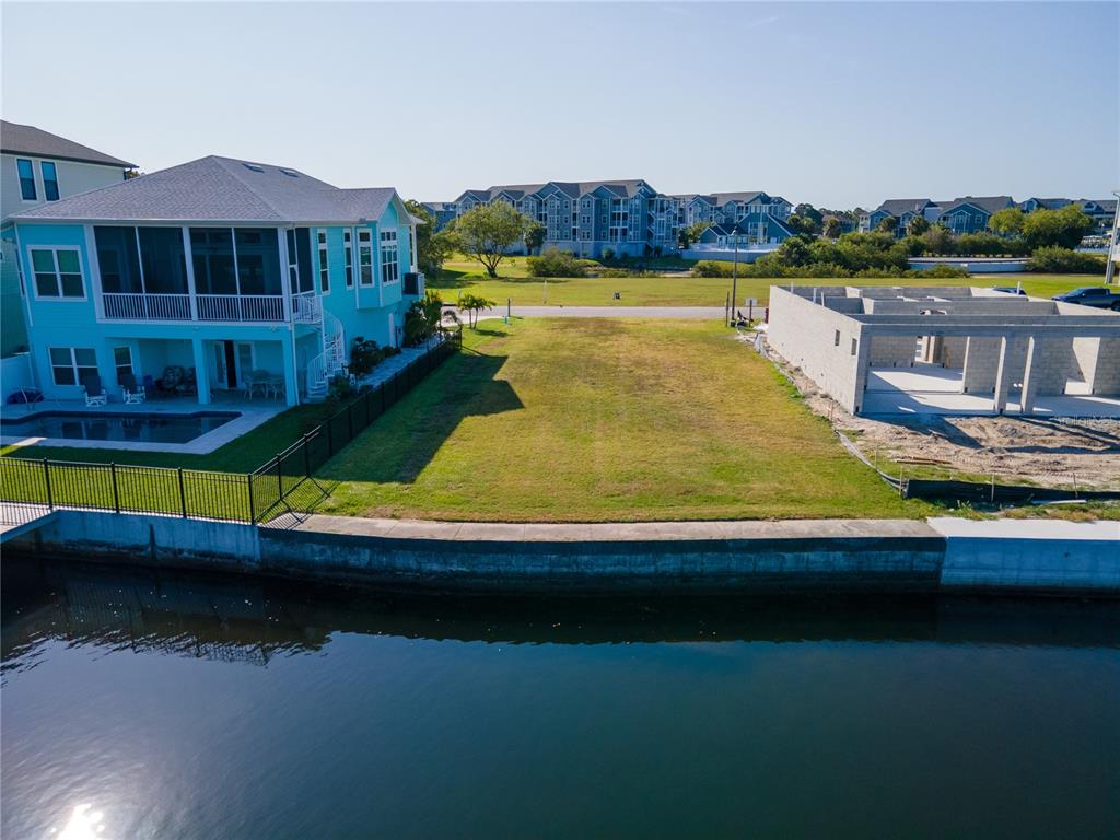 a swimming pool view with a lake view