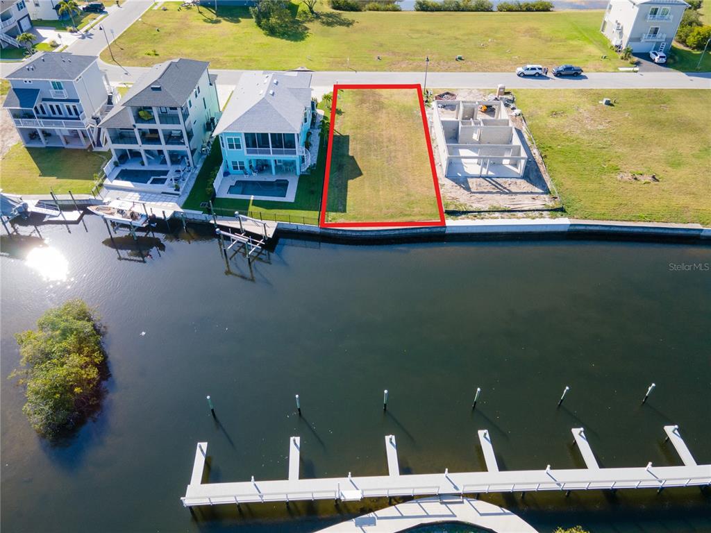 7 Elisabethan Lane New Port Richey, FL 34652 - Photo 6 of 16 an aerial view of a swimming pool with outdoor seating