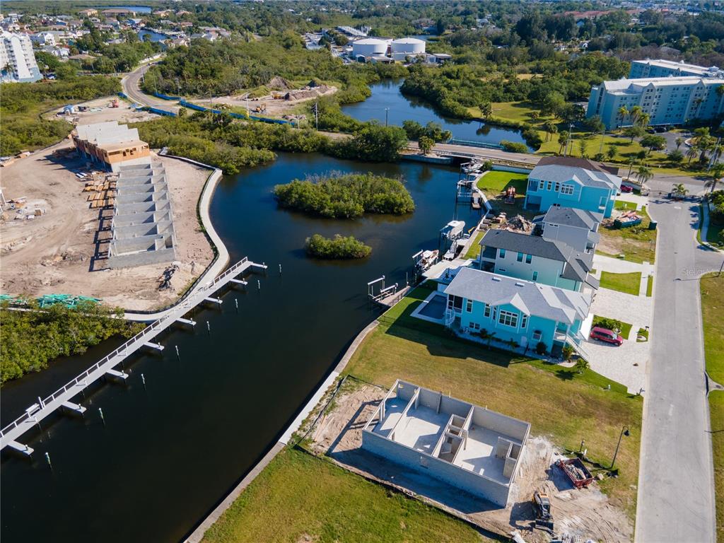 7 Elisabethan Lane New Port Richey, FL 34652 - Photo 9 of 16 an aerial view of residential houses with outdoor space