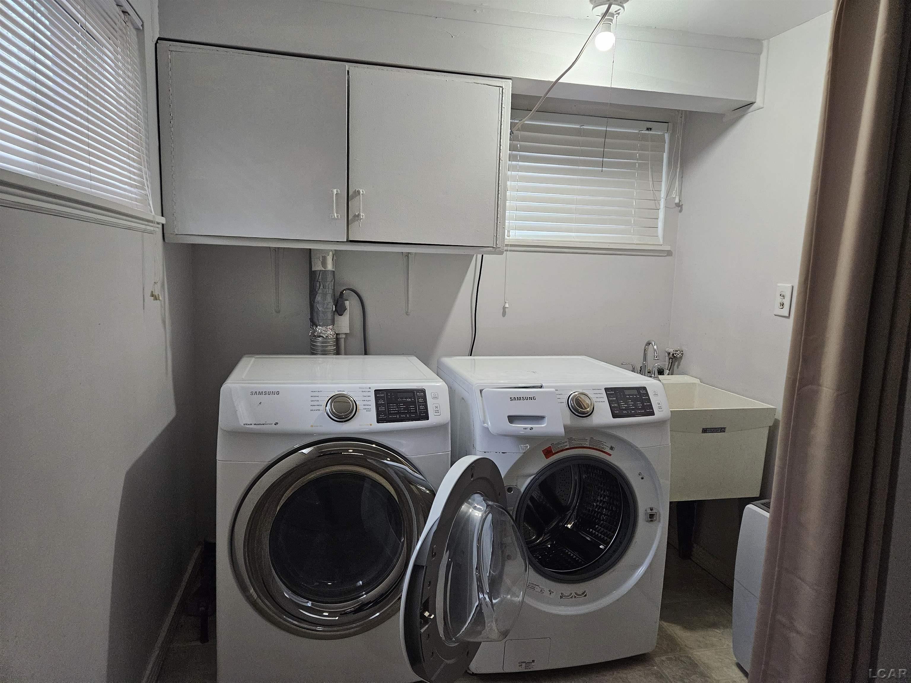 7076 Ridgedale Lane Lambertville, MI 48144 - Photo 30 of 36 LAUNDRY